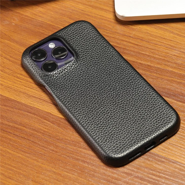 Funda para iPhone 15 Pro Max con textura de litchi, de cuero PU y tapa trasera de PET - Negro