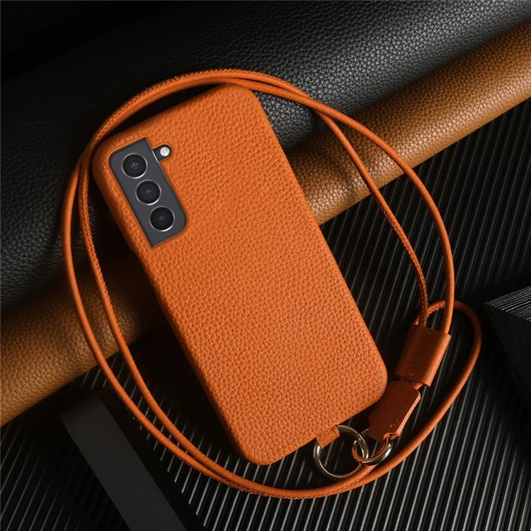 Coque pour Samsung Galaxy S21 4G / 5G avec dragonne en véritable cuir de vache et coque de protection arrière en PC - Orange