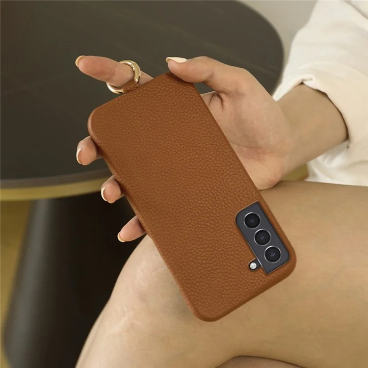 Coque pour Samsung Galaxy S21 4G / 5G avec dragonne en véritable cuir de vache et coque de protection arrière en PC - Orange