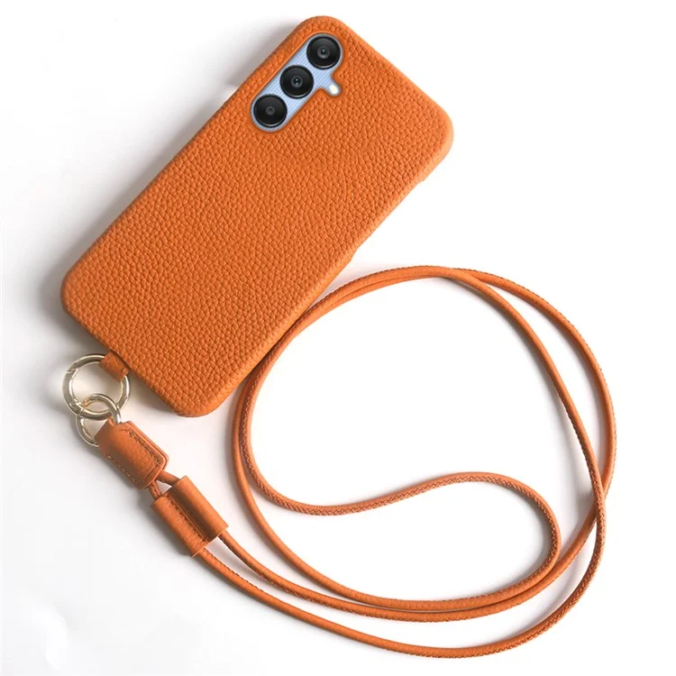 Coque pour Samsung Galaxy S23 FE avec dragonne, en véritable cuir de vache et plastique, coloris orange.