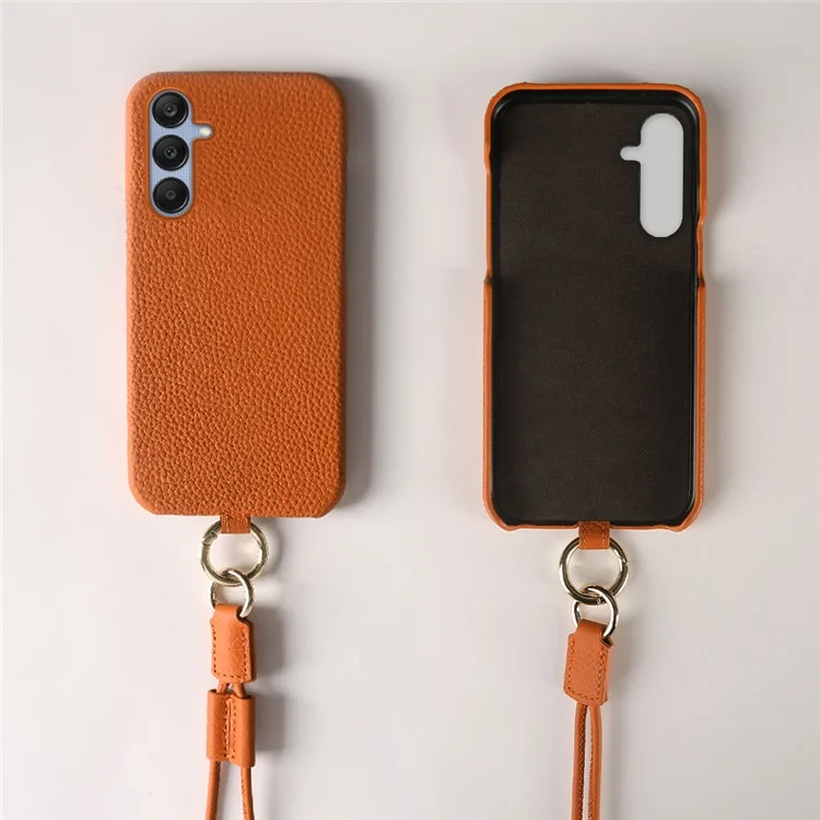 Coque pour Samsung Galaxy S23 FE avec dragonne, en véritable cuir de vache et plastique, coloris orange.