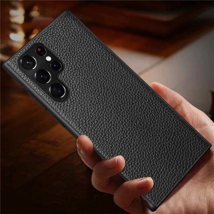 Für Samsung Galaxy S24 Ultra Hülle Litchi-Textur Echtes Leder beschichtete PC + TPU Handyhülle - Schwarz