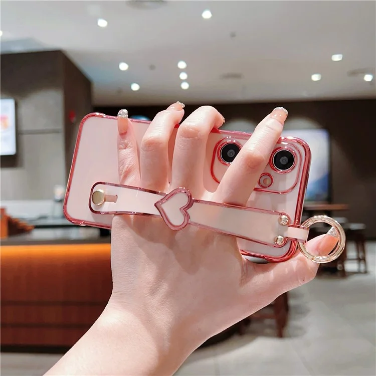 Capa para Samsung Galaxy S25+ Padrão de coração eletroplatinado TPU Capa traseira do telefone com pulseira e suporte - Rosa