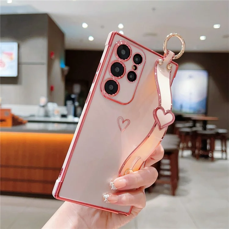 Capa para Samsung Galaxy S24 Ultra Eletroplatada com Padrão de Coração em TPU, Suporte para Pulseira e Apoio - Rosa