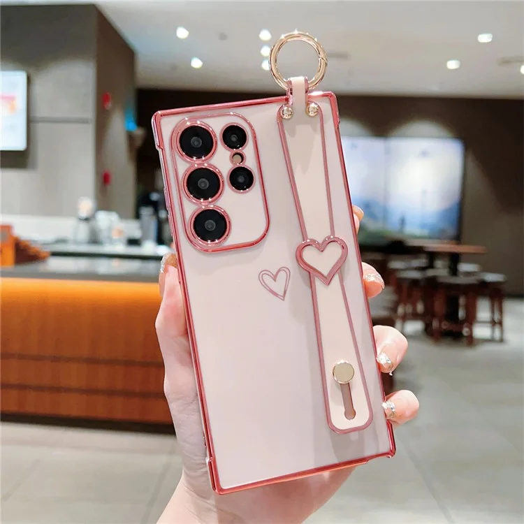 Capa para Samsung Galaxy S24 Ultra Eletroplatada com Padrão de Coração em TPU, Suporte para Pulseira e Apoio - Rosa