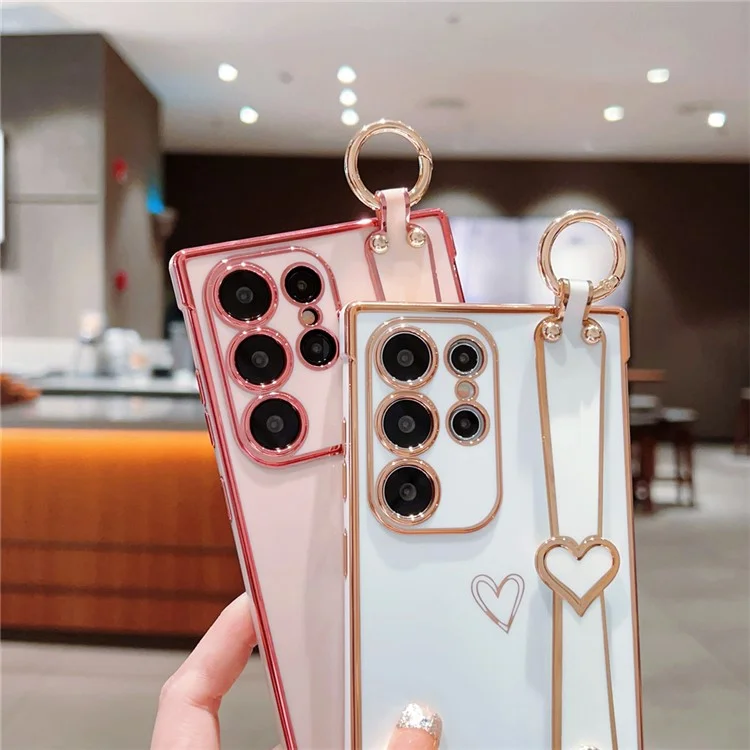 Capa para Samsung Galaxy S24 Ultra Eletroplatada com Padrão de Coração em TPU, Suporte para Pulseira e Apoio - Rosa