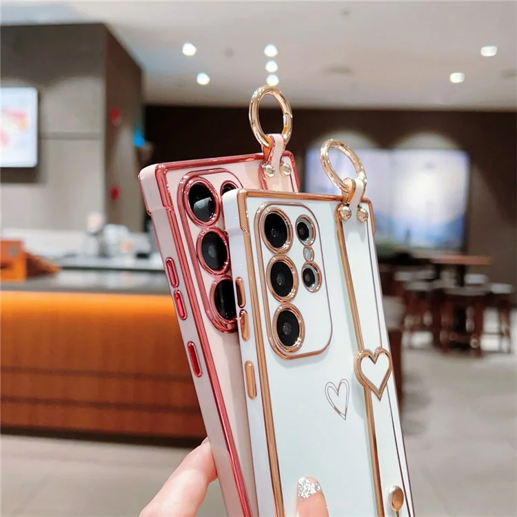 Capa para Samsung Galaxy S24 Ultra Eletroplatada com Padrão de Coração em TPU, Suporte para Pulseira e Apoio - Rosa