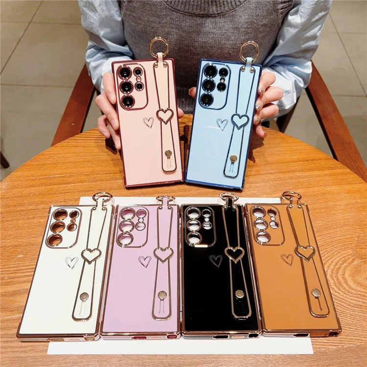 Capa para Samsung Galaxy S24 Ultra Eletroplatada com Padrão de Coração em TPU, Suporte para Pulseira e Apoio - Rosa