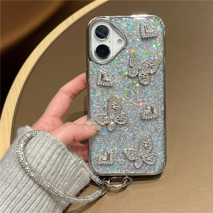 Funda para iPhone 16 con Purpurina, Mariposa y Corazón, Diseño de Resina Epoxi, Carcasa Protectora TPU PC con Correa de Muñeca