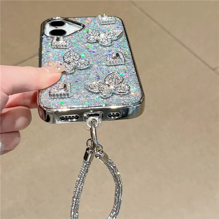 Funda para iPhone 16 con Purpurina, Mariposa y Corazón, Diseño de Resina Epoxi, Carcasa Protectora TPU PC con Correa de Muñeca