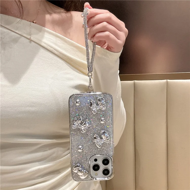Funda para iPhone 16 con Lazo, Cuentas de Plata, Purpurina Epoxi, Cubierta Electropulida de PC y TPU con Correa