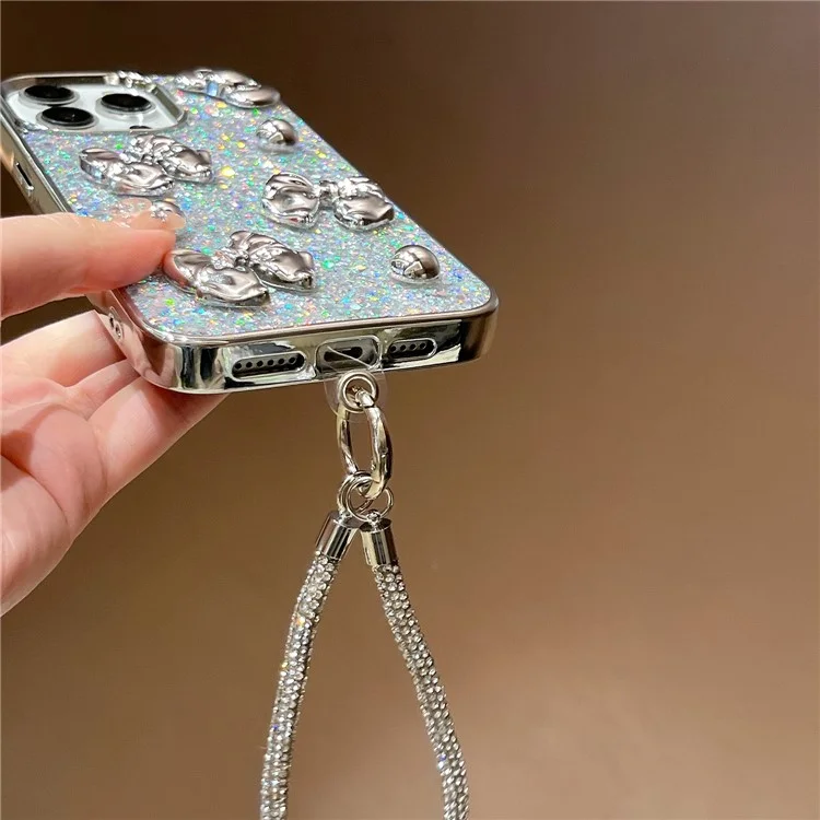 Funda para iPhone 16 con Lazo, Cuentas de Plata, Purpurina Epoxi, Cubierta Electropulida de PC y TPU con Correa