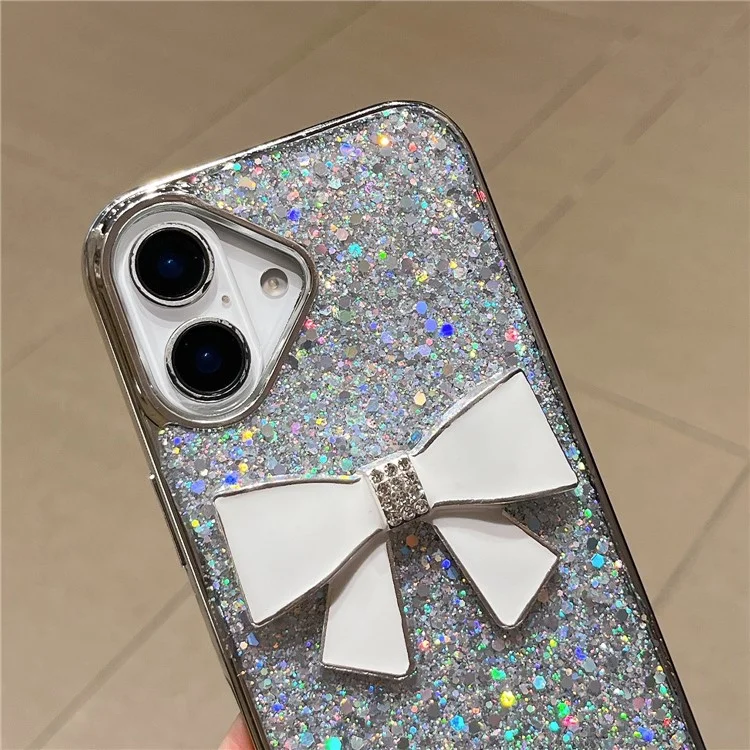 For iPhone 16 Case Large Bowknot Electroplated Glitter Epoxy Shockproof Phone Cover with Strap - White