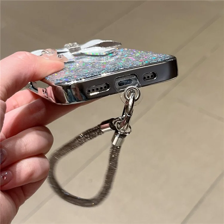For iPhone 16 Case Large Bowknot Electroplated Glitter Epoxy Shockproof Phone Cover with Strap - White