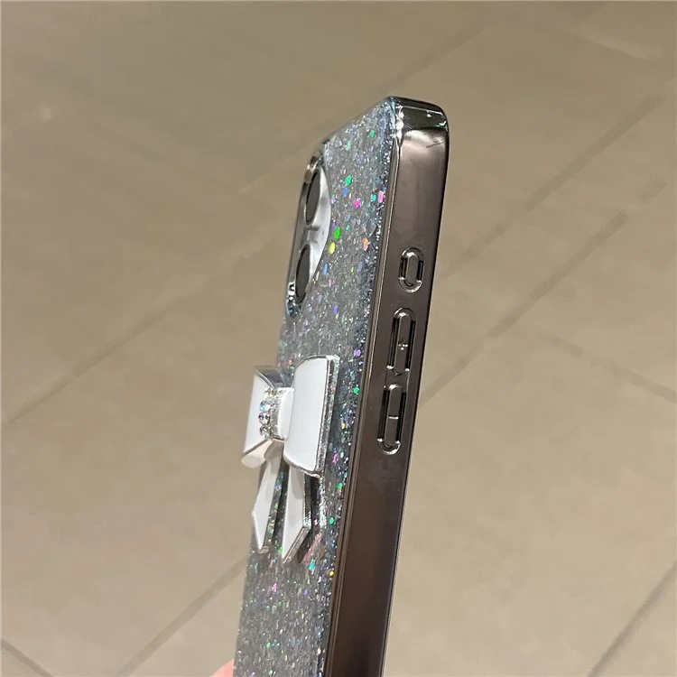 For iPhone 16 Case Large Bowknot Electroplated Glitter Epoxy Shockproof Phone Cover with Strap - White