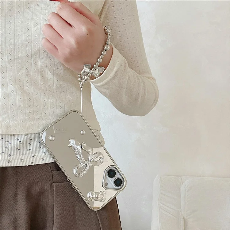 For iPhone 16 Case 3D Bowknot Mirror Surface Design Phone Back Cover with Strap