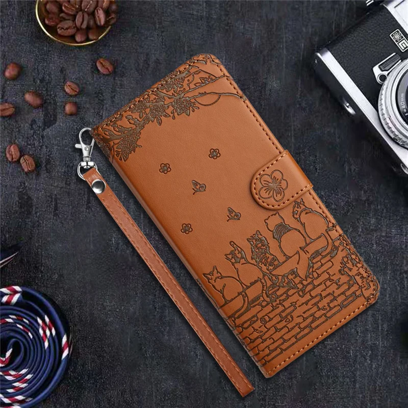 For Google Pixel 9a Case with Wrist Strap Leather Phone Cover Wall Cats Pattern - Brown