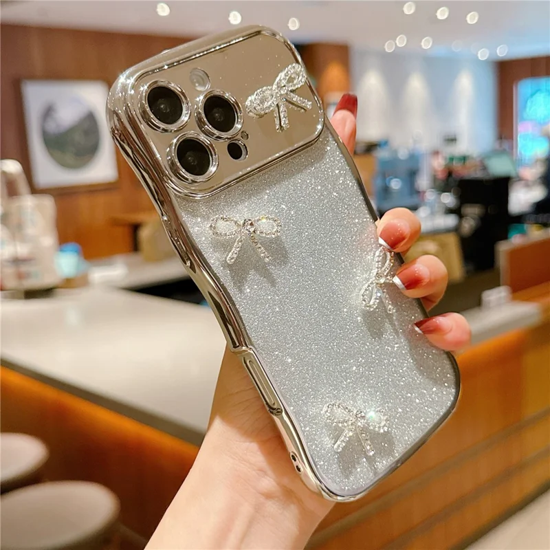 For iPhone 16 Pro Max Case Electroplated Wavy Frame Glitter TPU Phone Cover with Rhinestone Bow Decor - Silver