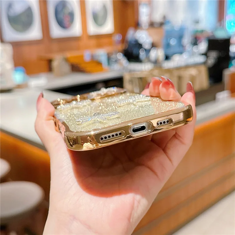 For iPhone 16 Pro Max Case Electroplated Wavy Frame Glitter TPU Phone Cover with Rhinestone Bow Decor - Silver