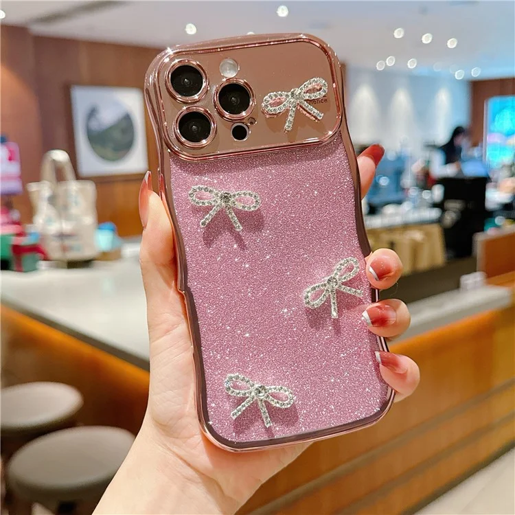 For iPhone 16 Pro Case Electroplated Wavy Frame Glitter TPU Phone Cover with Rhinestone Bow Decor - Rose Pink