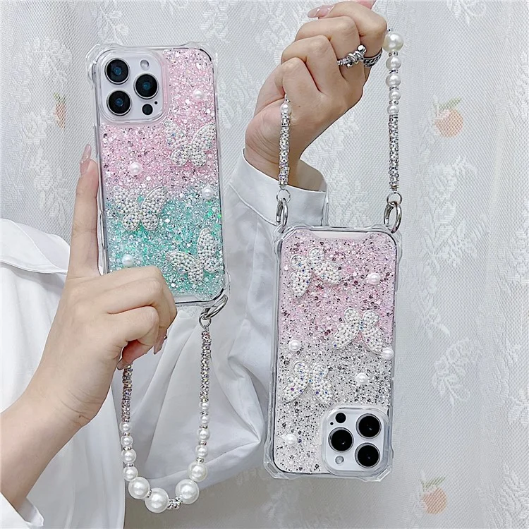 For iPhone 15 Pro Max Case with Strap Epoxy Glitter Butterfly Decor TPU + Acrylic Phone Back Cover - Pink / Yellow