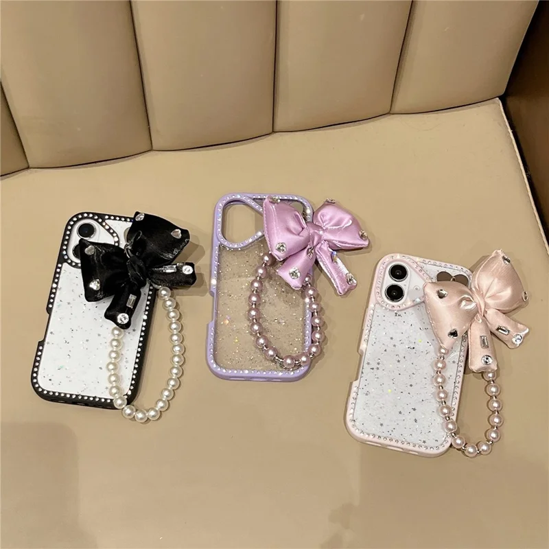 For iPhone 16 Case Glitter Epoxy Design TPU + PC Phone Back Cover with Bow Strap, Rhinestone Decor - Black
