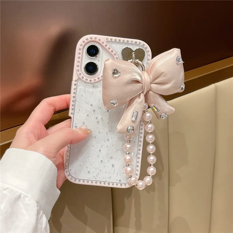 Funda para iPhone 16 con Diseño de Purpurina Epoxi, Carcasa Trasera de TPU + PC con Lazo, Decoración de Strass - Rosa