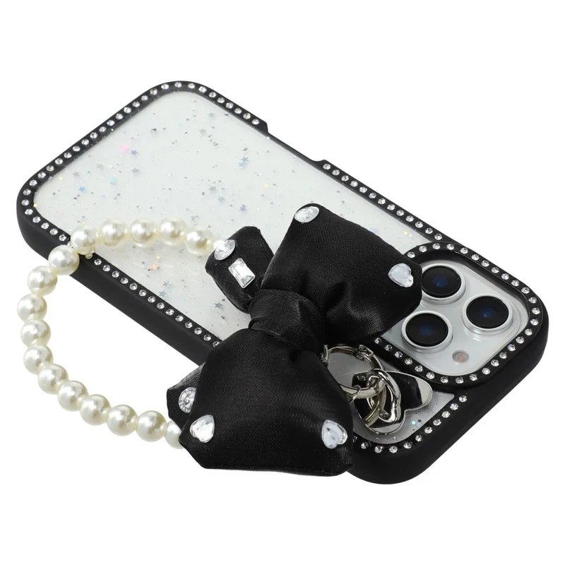 For iPhone 16 Pro Case Glitter Epoxy Design TPU + PC Phone Back Cover with Bow Strap, Rhinestone Decor - Black