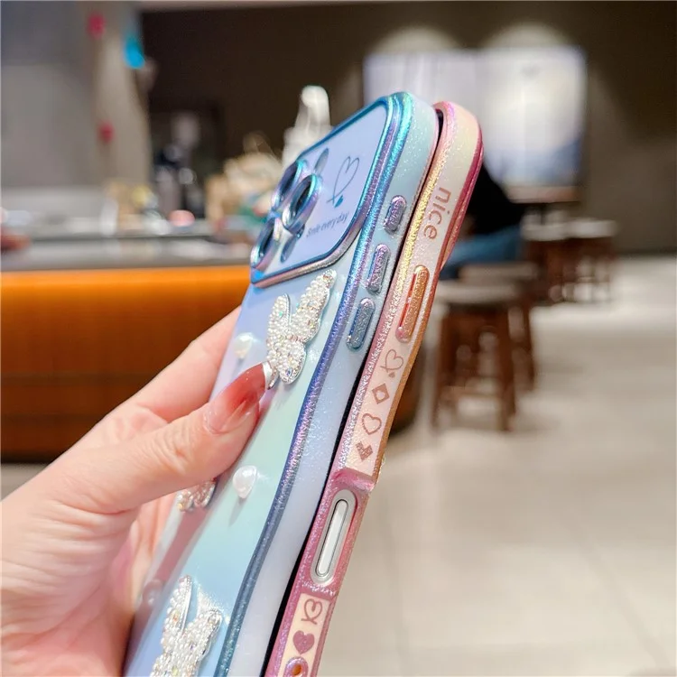 For iPhone 16 Pro Case Electroplating Wave Edge Dazzling Color TPU Phone Cover Pearl Butterfly Decor - White