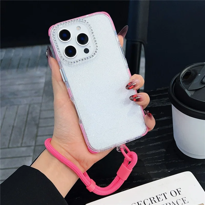 For iPhone 16 Pro Case Rhinestone Decor Glitter TPU Anti Drop Phone Cover with Adjustable Wrist Strap - Pink