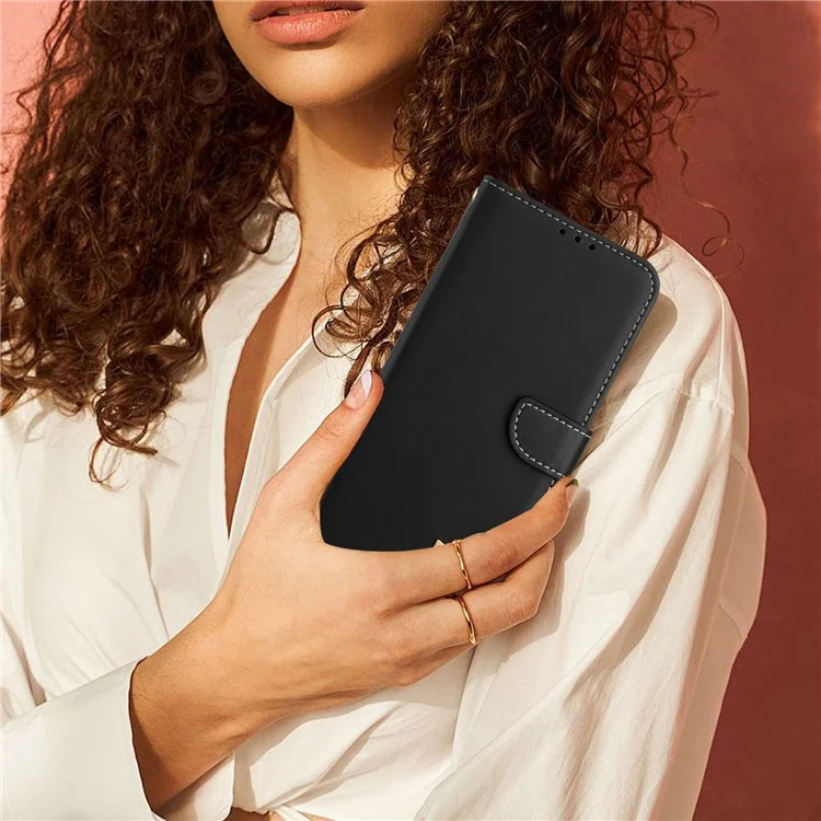 Für iPhone 16e Hülle mit Schleifendekor Geldbörse Leder Handyhülle mit Handschlaufe - Schwarz