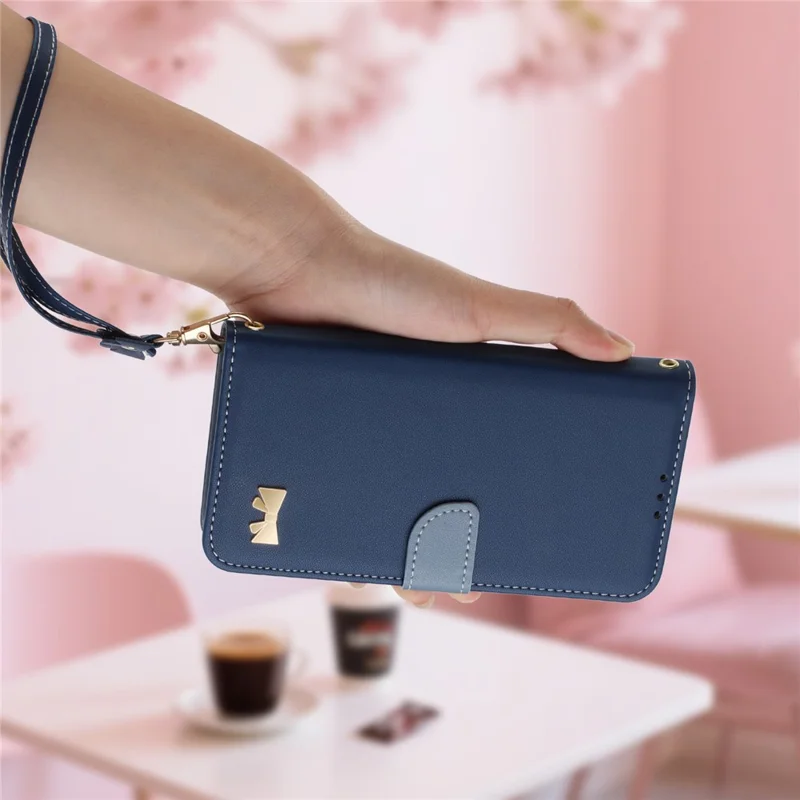 For Google Pixel 10 Pro XL / 9 Pro XL Case Bowknot Decor Wallet Leather Phone Cover with Wrist Strap - Dark Blue