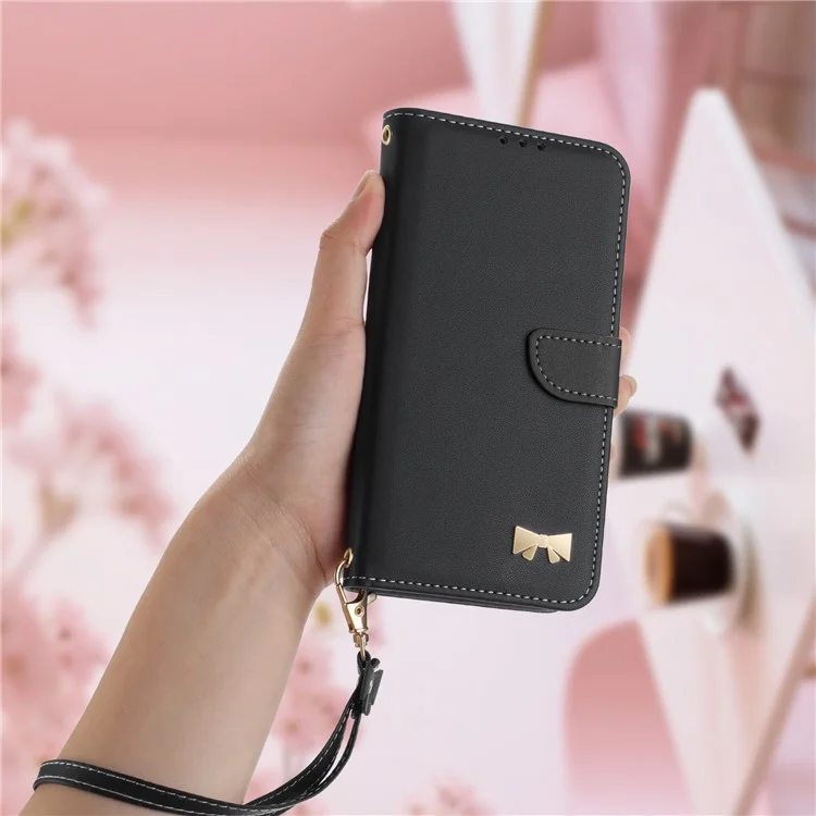 For Xiaomi Redmi Note 14 4G (163.25mm) Case Bowknot Decor Wallet Leather Phone Cover with Wrist Strap - Black