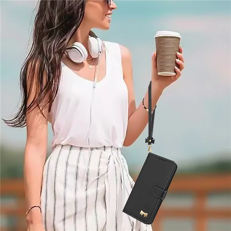 For Xiaomi Redmi Note 14 4G (163.25mm) Case Bowknot Decor Wallet Leather Phone Cover with Wrist Strap - Black