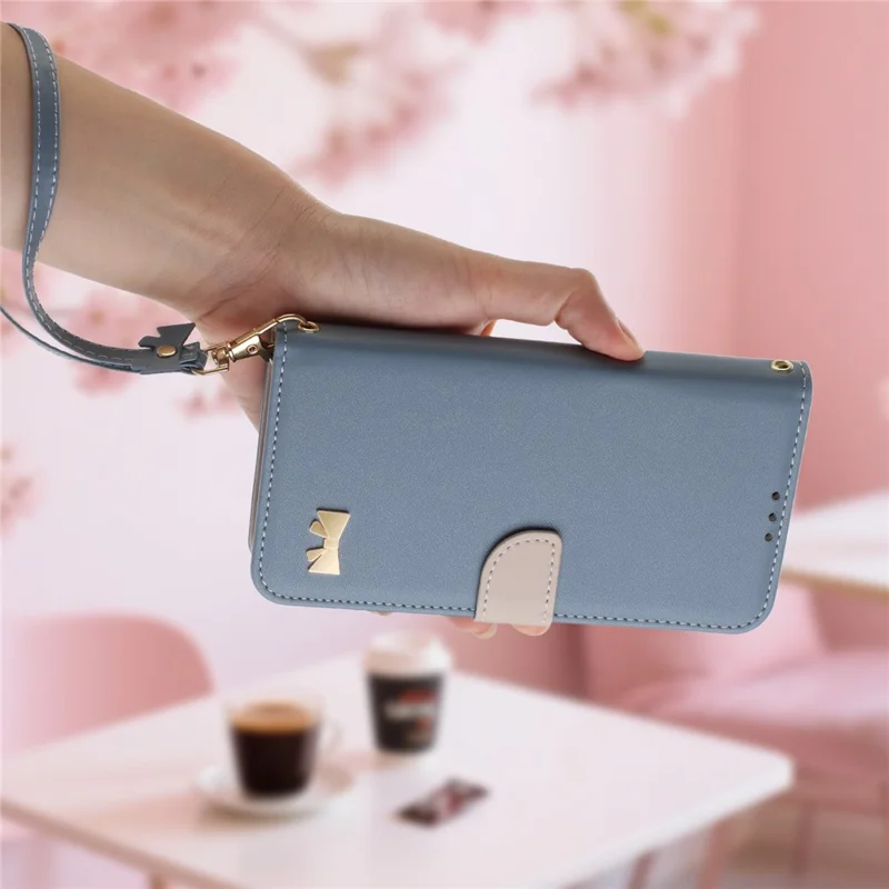 For Xiaomi Redmi Note 14 Pro 4G Case Bowknot Decor Wallet Leather Phone Cover with Wrist Strap - Baby Blue