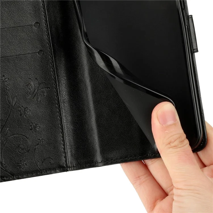 For iPhone 17 Leather Wallet Case Butterfly Flower Imprinted Phone Cover with Strap - Black