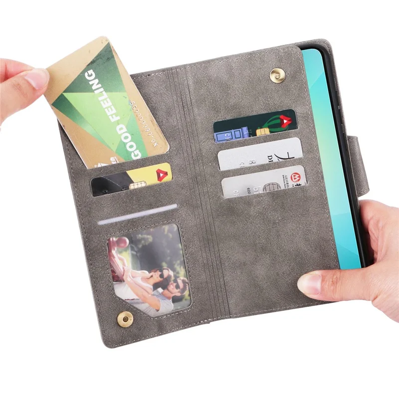 Phone Case For Samsung Galaxy A07 4G / A06 4G / A06 5G Zipper Wallet Rivet Decor Leather Cover with Wrist Strap - Grey