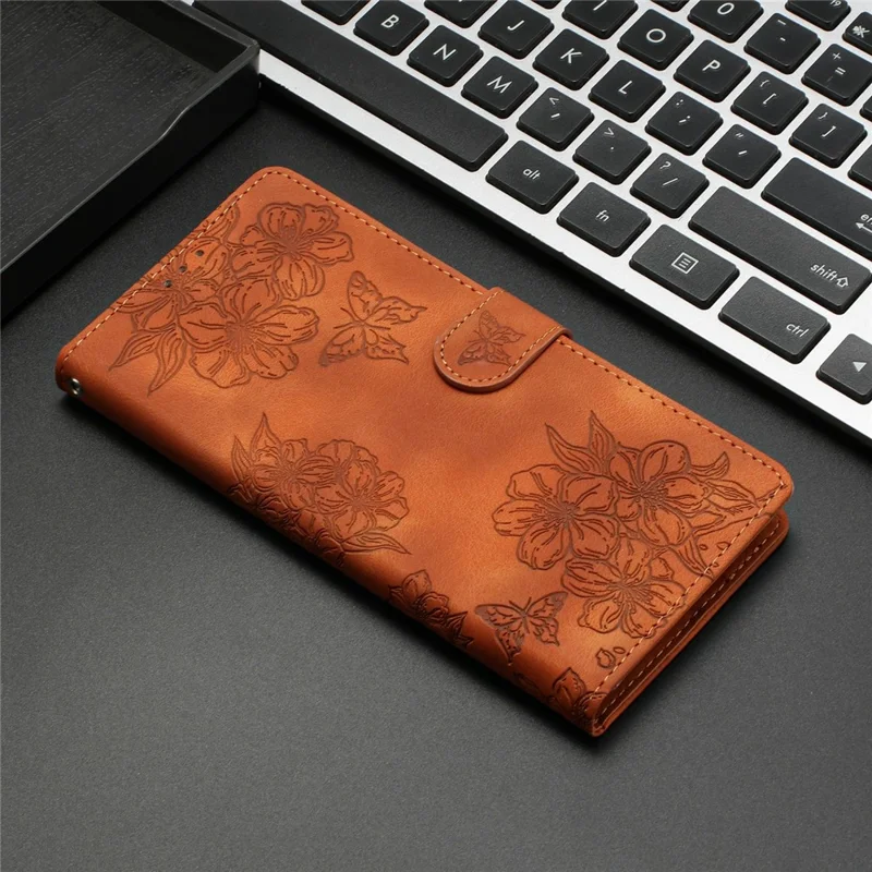 For Xiaomi Redmi Note 14 Pro 4G Case Butterfly Flower Pattern Skin-Touch Leather Phone Cover - Brown