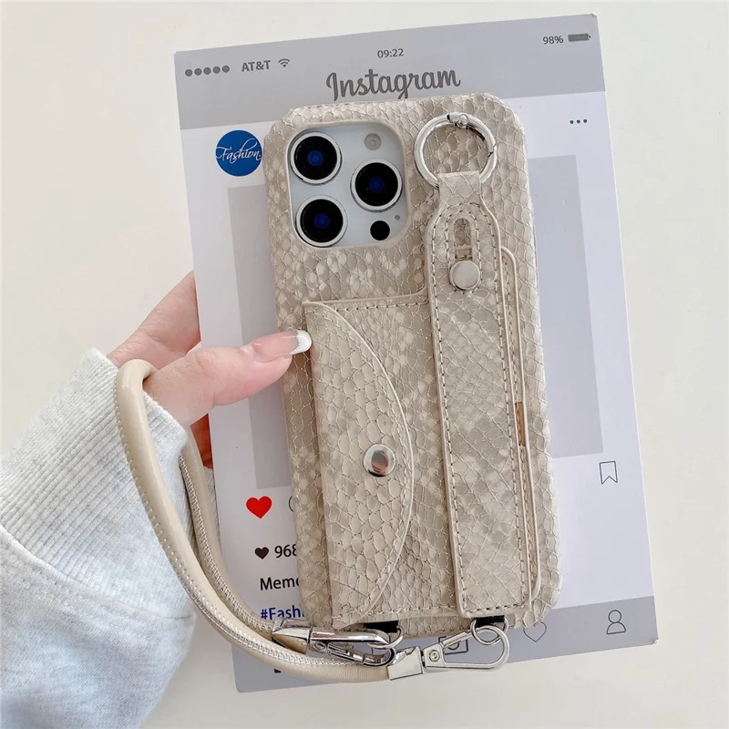 For iPhone 15 Pro Max Case Card Holder Wristband Lacquered Snake Texture PU + PC Back Cover with Lanyard - Khaki