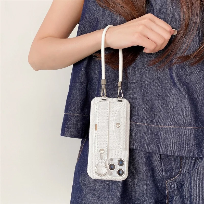 For iPhone 15 Pro Max Case Card Holder Wristband Lacquered Snake Texture PU + PC Back Cover with Lanyard - Khaki