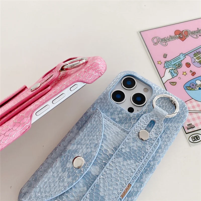 For iPhone 15 Pro Max Case Card Holder Wristband Lacquered Snake Texture PU + PC Back Cover with Lanyard - Khaki