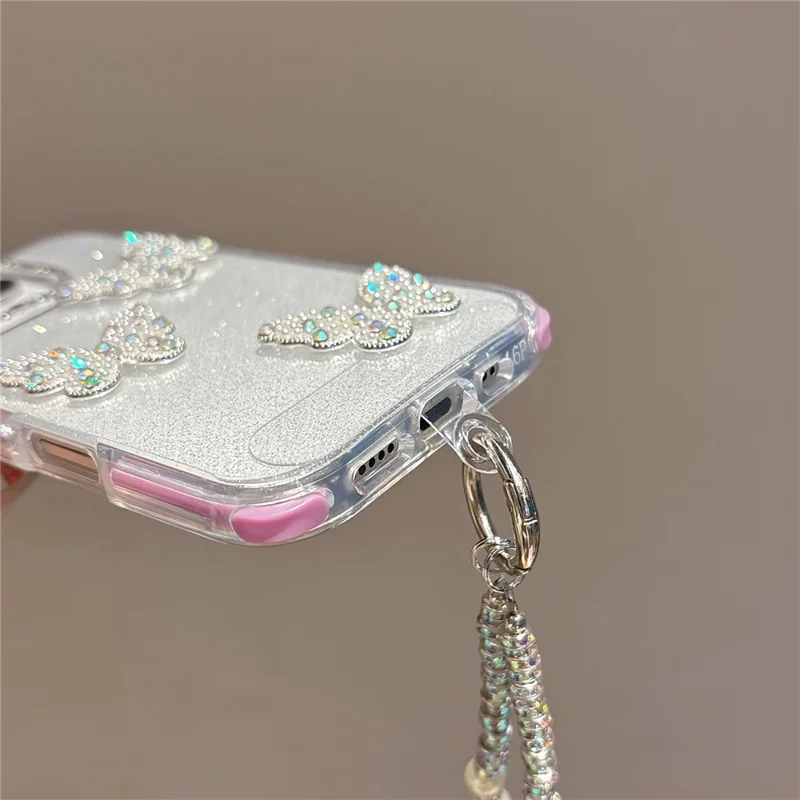 For iPhone 16 Pro Case Glitter Rhinestone Decor Butterfly TPU + PC Phone Case with Beaded Strap - Black