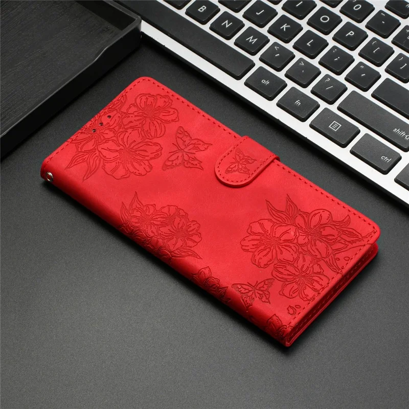 For iPhone 17 Pro Case Butterfly Flower Pattern Skin-Touch Leather Phone Cover - Red
