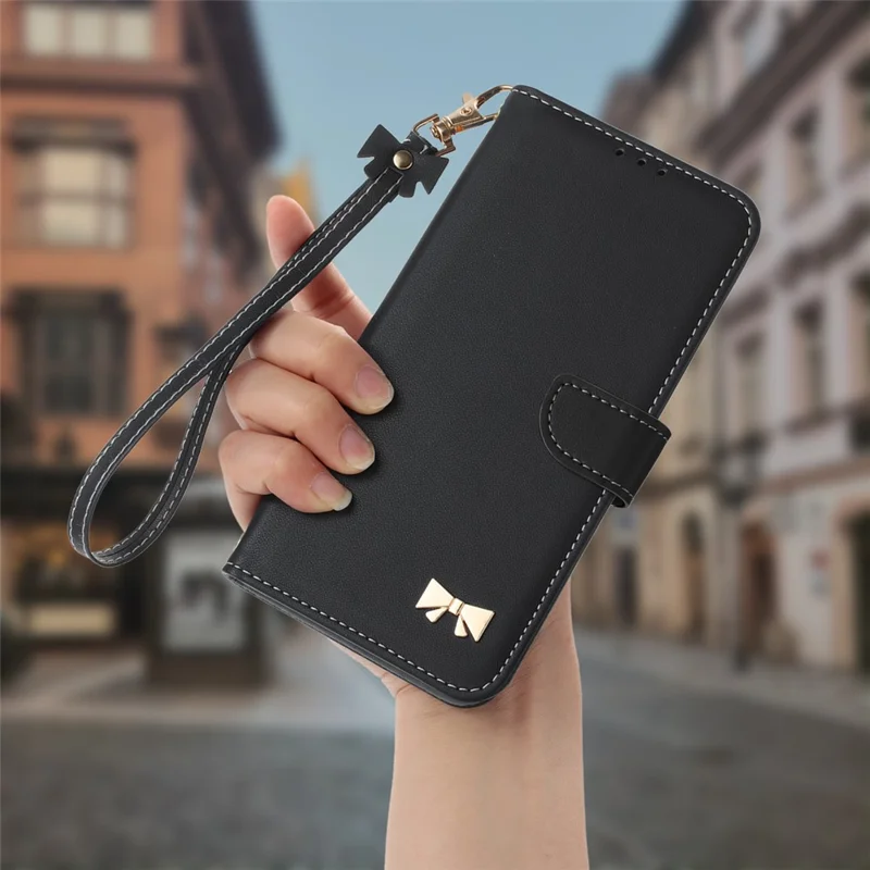 For Samsung Galaxy A17 5G / A26 5G Case Bowknot Decor Wallet Leather Phone Cover with Wrist Strap - Black