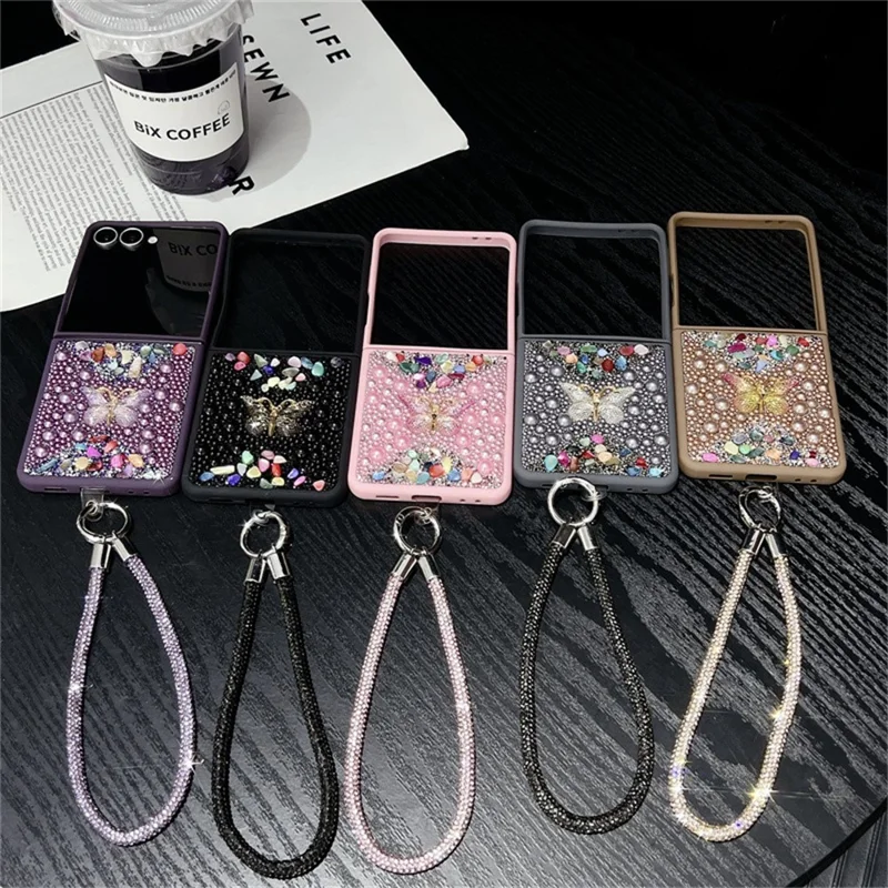 Funda para Samsung Galaxy Z Flip7 5G con Correa de Mano, Decoración de Mariposa con Strass de Colores, Carcasa Protectora de PC - Negro