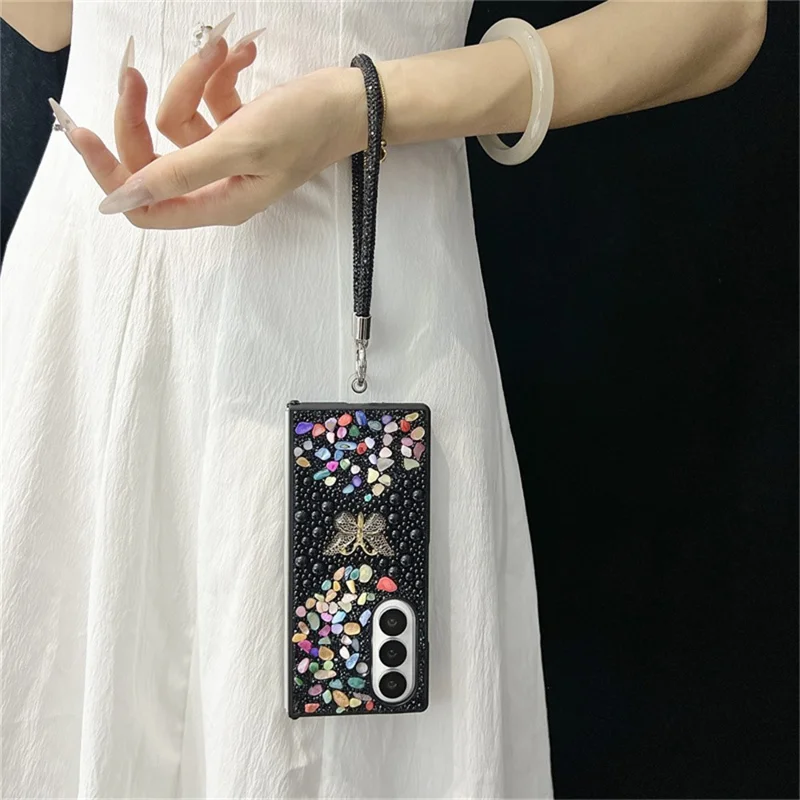 For Samsung Galaxy Z Fold7 5G Phone Case with Hand Strap Colorful Rhinestone Butterfly Decor PC Mobile Cover - Black