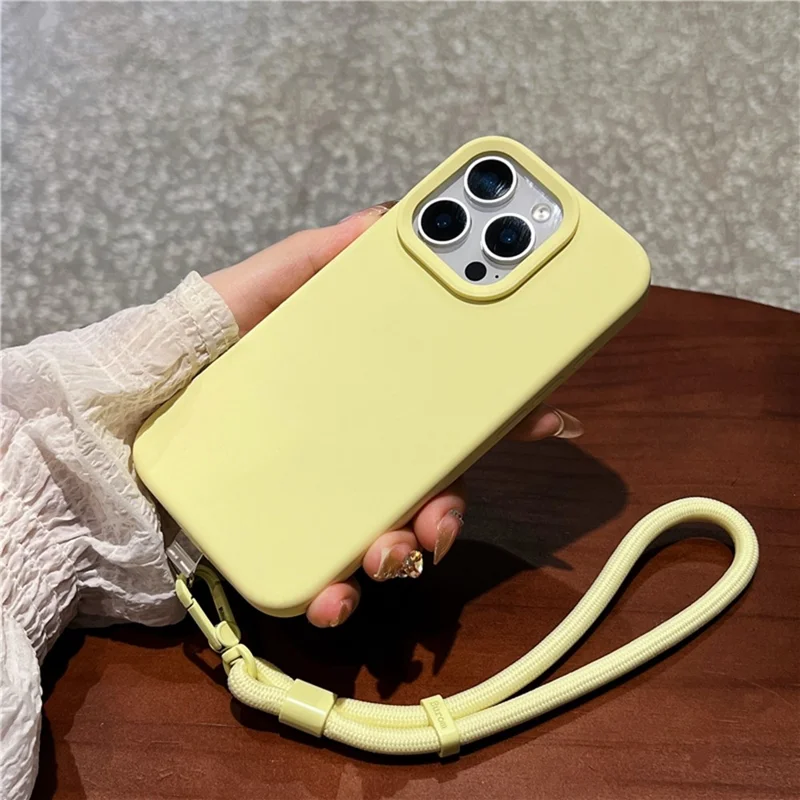 Capa para iPhone 16 Pro de Silicone Líquido + PC com Forro de Microfibra Macia e Alça de Pulso - Amarelo Claro
