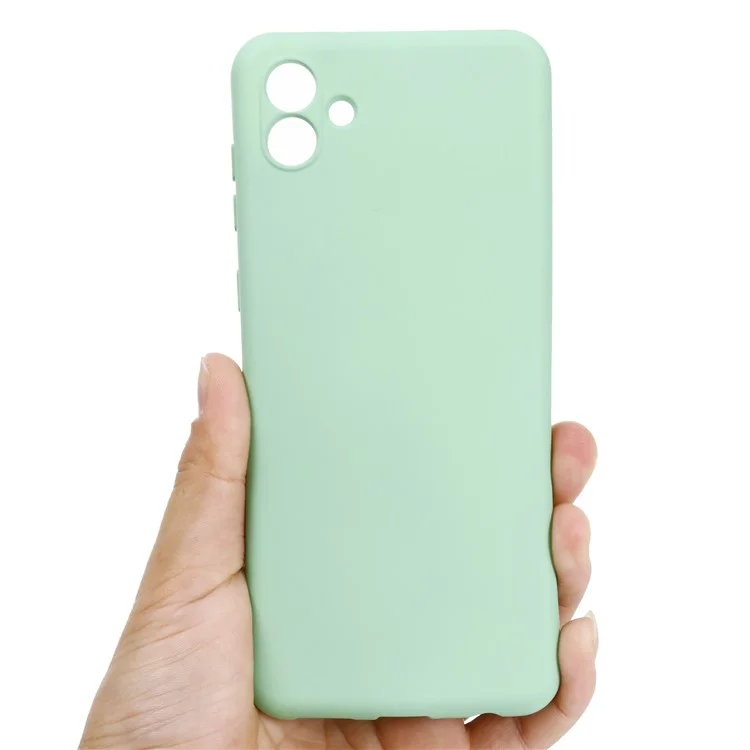 Für Samsung Galaxy A04 4G (164,4 x 76,3 x 9,1 mm) Flüssigsilikon-Telefonhülle, kratzfest, Weichfaserauskleidung, Kamerasschutz mit Trageriemen - Grün