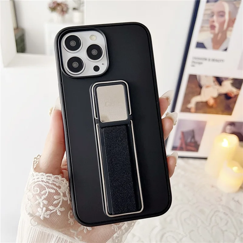 Funda para iPhone 16 Pro de TPU + PC con Soporte y Correa Elástica para Dedo - Negro