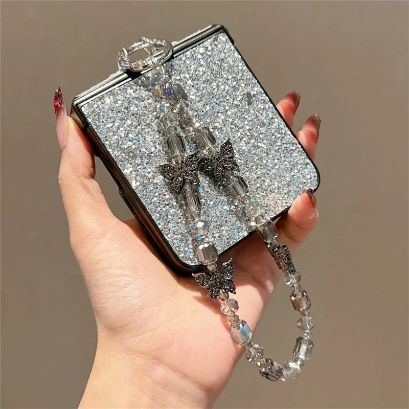 For Samsung Galaxy Z Flip7 5G Case Glitter Rhinestone TPU PC Phone Cover with Butterfly Wrist Strap - Silver